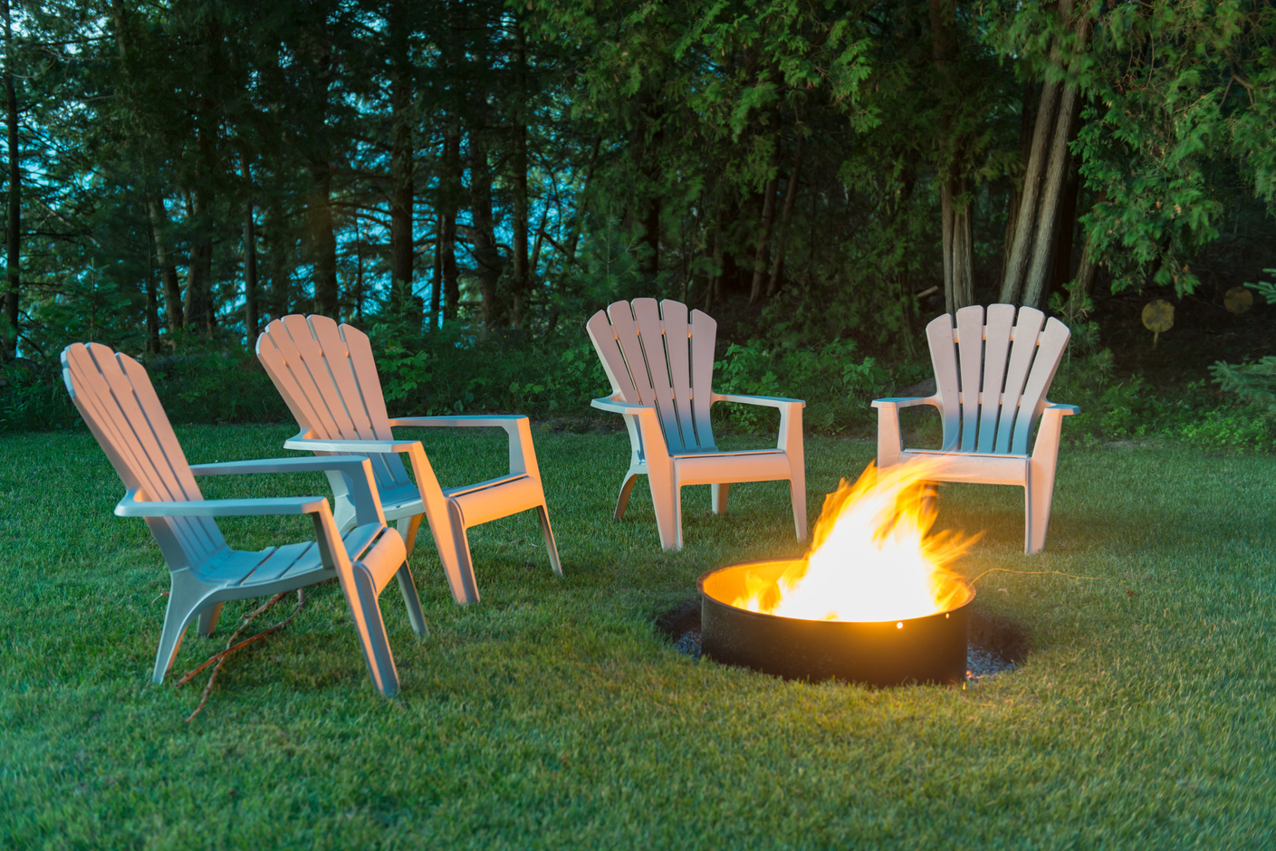 Chairs around a camp fire